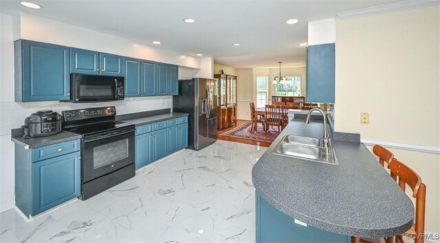 3090 Magnolia Woods Ct, Quinton, VA 23141 - kitchen with recessed lighting, a sink, blue cabinets, and black appliances