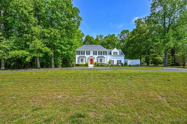 3090 Magnolia Woods Ct, Quinton, VA 23141 - colonial home featuring driveway and a front lawn