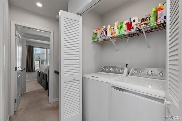 washroom featuring laundry area, light carpet, recessed lighting, and washing machine and clothes dryer