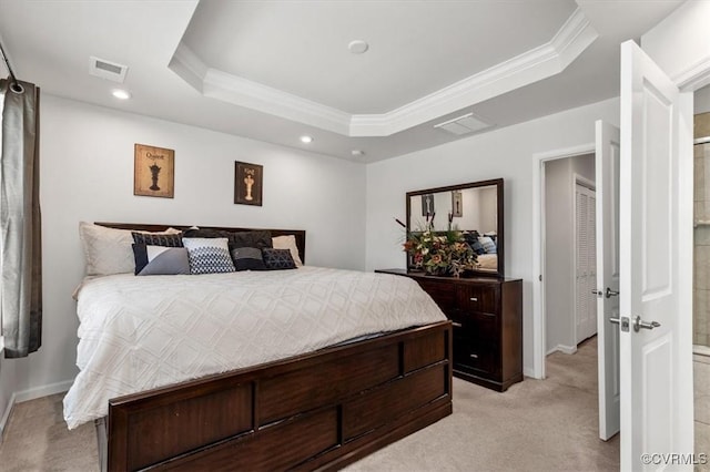 bedroom featuring visible vents, light carpet, a raised ceiling, ornamental molding, and baseboards