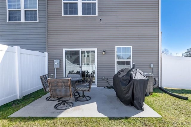 view of patio with central AC unit and a fenced backyard