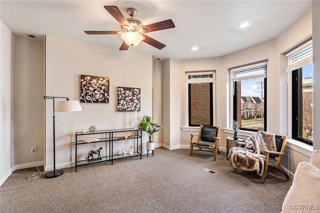 sitting room with a ceiling fan, recessed lighting, baseboards, and carpet floors