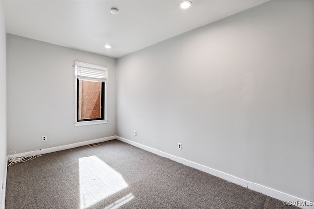 unfurnished room featuring recessed lighting, visible vents, baseboards, and carpet floors