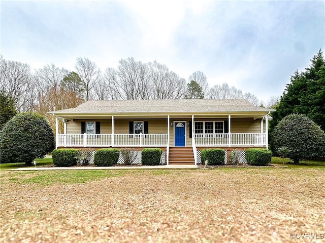 single story home featuring covered porch