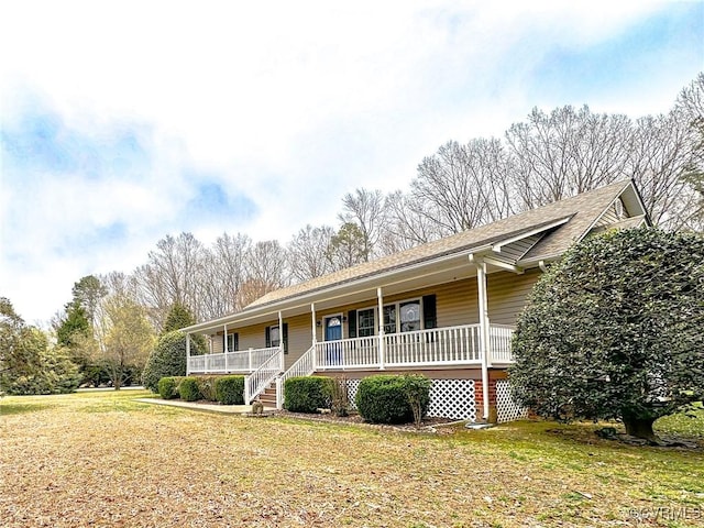 single story home with roof with shingles, a porch, and a front lawn