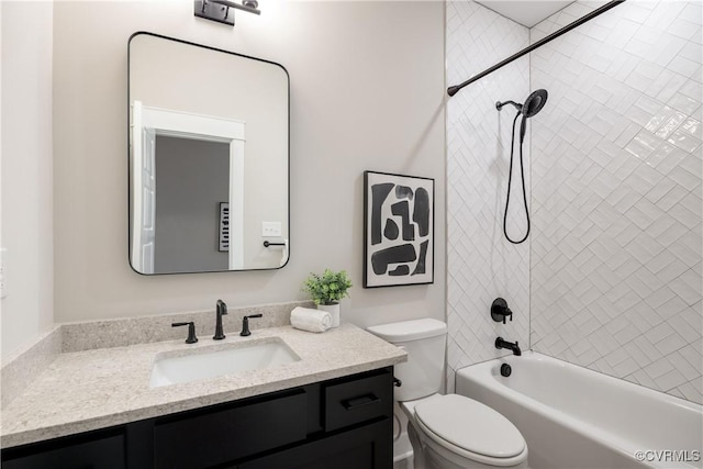 bathroom featuring shower / bath combination, toilet, and vanity