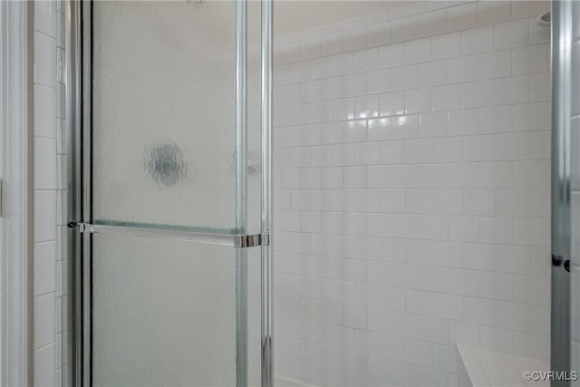 full bathroom with a stall shower