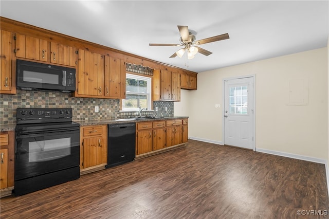 kitchen with ceiling fan, black appliances, brown cabinets, and a sink