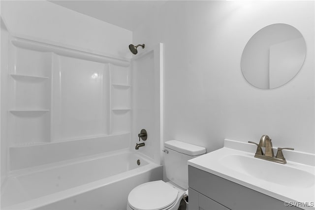 full bathroom featuring shower / bathing tub combination, toilet, and vanity