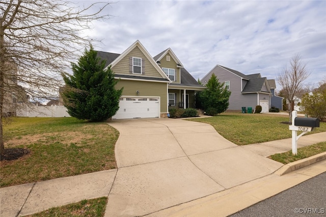 view of front of home featuring a garage, concrete driveway, and a front lawn