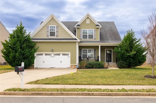 craftsman-style house featuring a garage, a porch, concrete driveway, and a front lawn