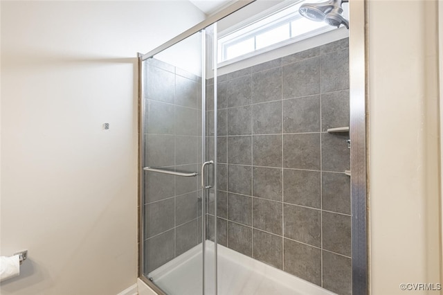 full bathroom with a shower stall