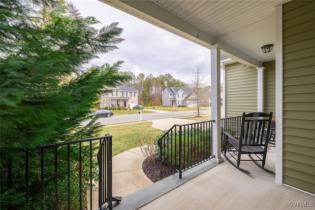 view of patio featuring a residential view and covered porch