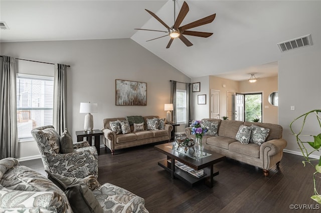 living area featuring visible vents, ceiling fan, and dark wood finished floors