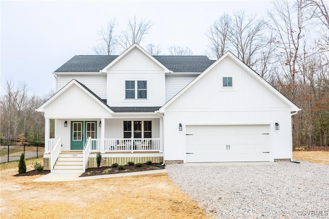 modern inspired farmhouse with a garage, a porch, driveway, and a shingled roof