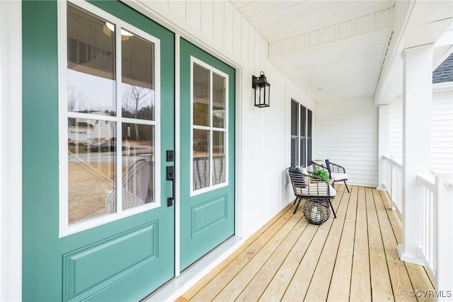 wooden terrace featuring a porch