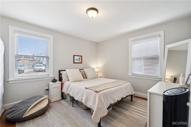 bedroom featuring baseboards