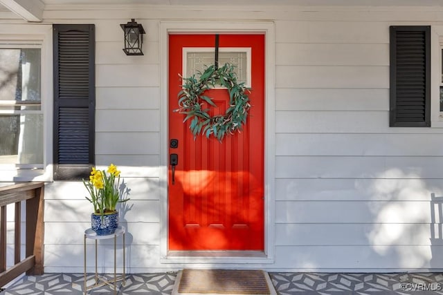 entrance to property with covered porch