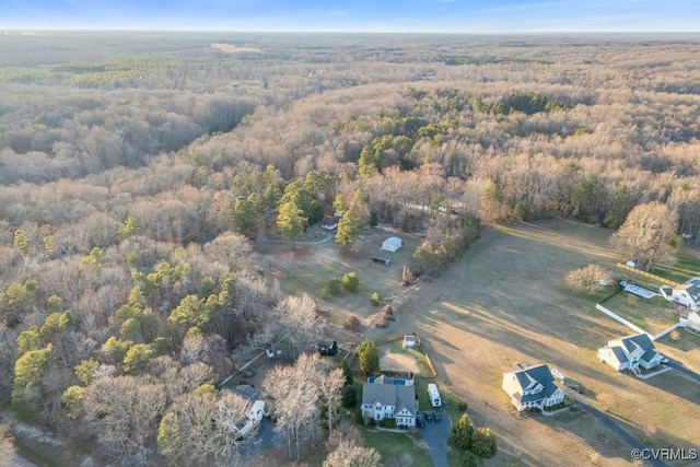 aerial view with a wooded view