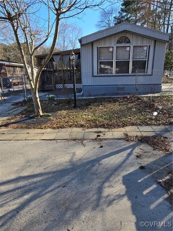 view of front of home with crawl space