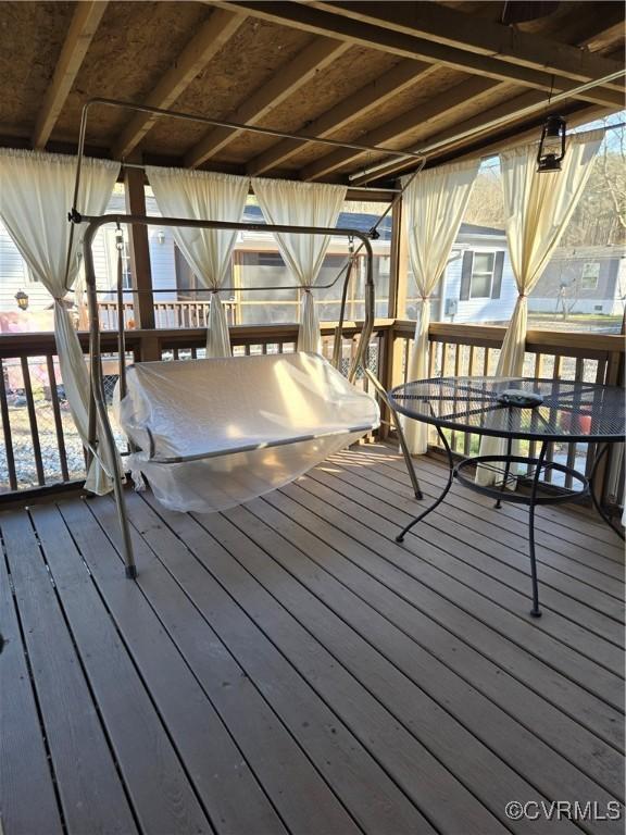 deck featuring outdoor dining space