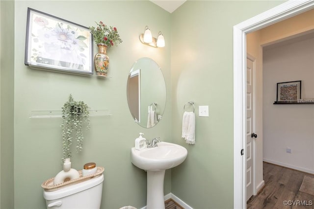 8160 Lyman Ct, Mechanicsville, VA 23116 - bathroom featuring toilet and wood finished floors