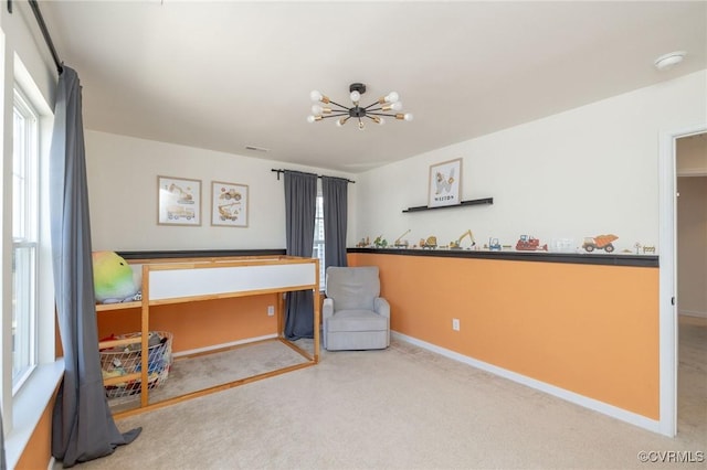 8160 Lyman Ct, Mechanicsville, VA 23116 - living area featuring a chandelier and carpet