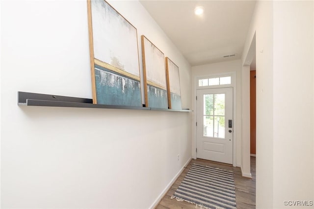8160 Lyman Ct, Mechanicsville, VA 23116 - doorway with wood finished floors and baseboards