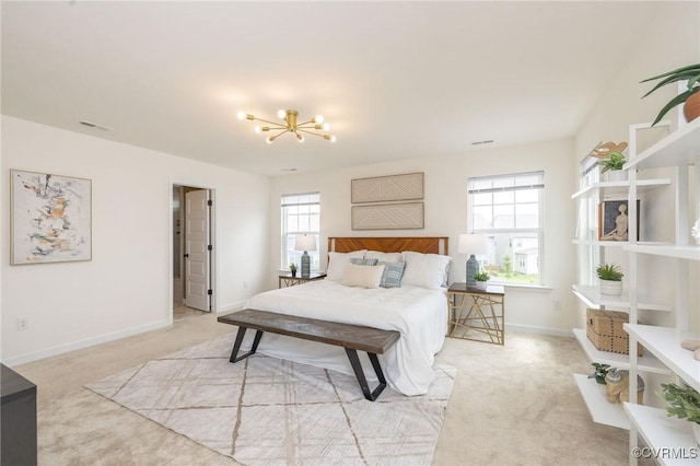 8160 Lyman Ct, Mechanicsville, VA 23116 - bedroom featuring light carpet and a chandelier
