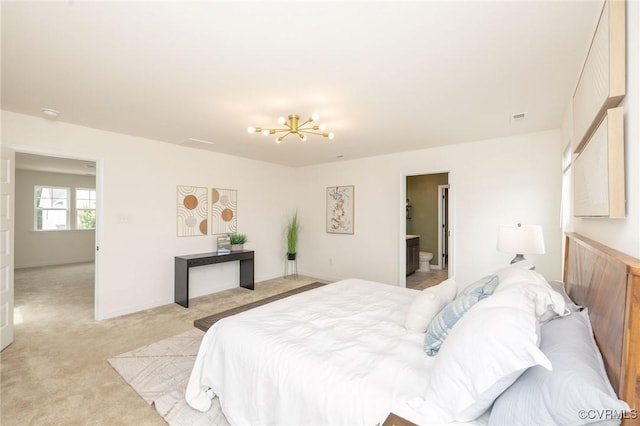 8160 Lyman Ct, Mechanicsville, VA 23116 - bedroom featuring a chandelier and light colored carpet