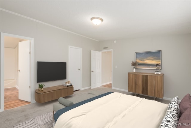 bedroom featuring visible vents, baseboards, and carpet floors