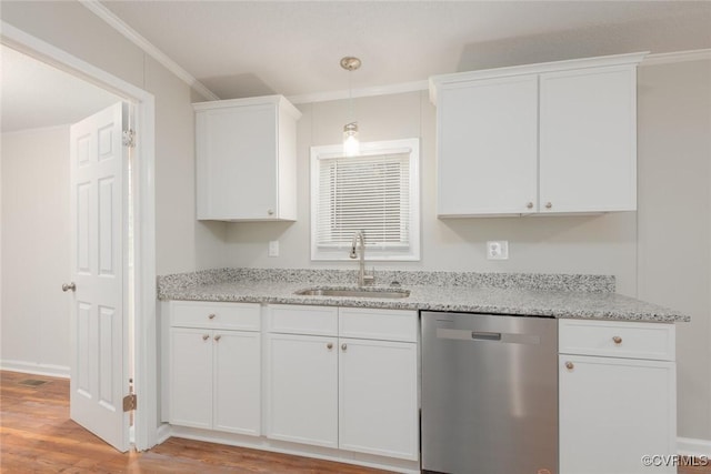 kitchen featuring a sink, white cabinetry, crown molding, light wood finished floors, and dishwasher