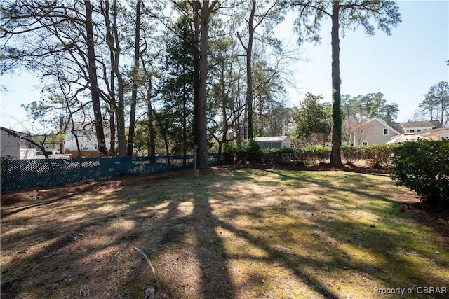 view of yard with fence