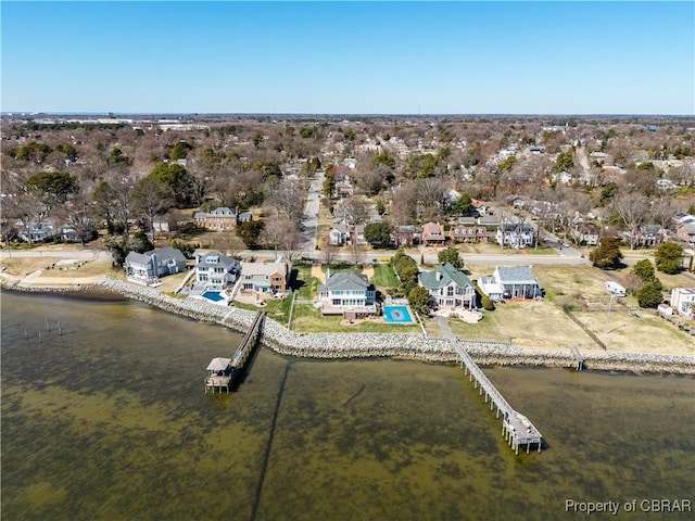 aerial view with a water view and a residential view