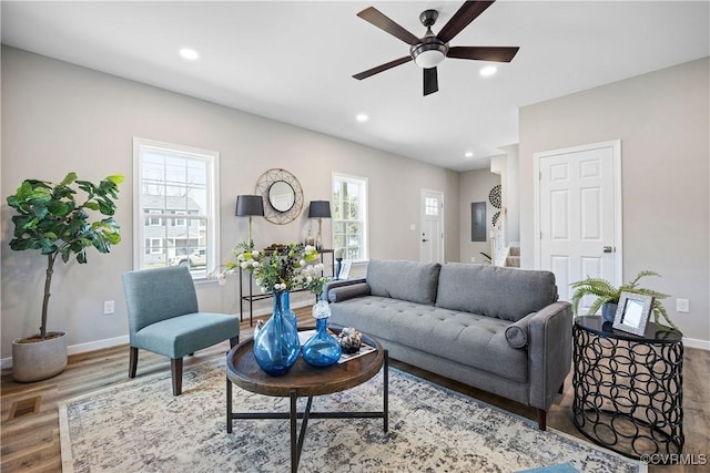 living area featuring recessed lighting, a healthy amount of sunlight, and ceiling fan