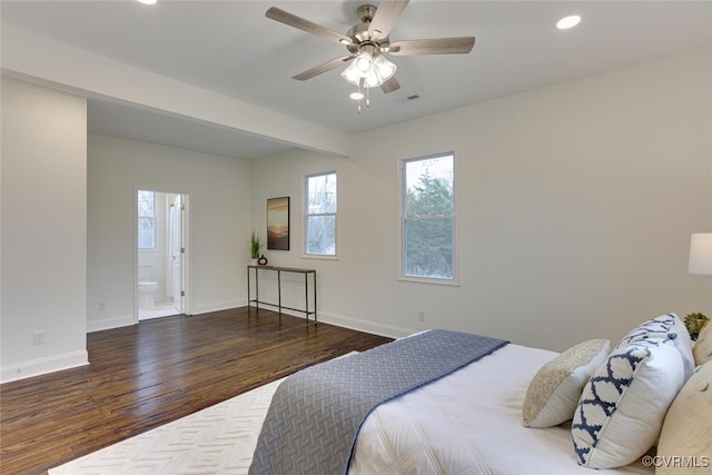 bedroom with a ceiling fan, recessed lighting, connected bathroom, baseboards, and dark wood-style flooring