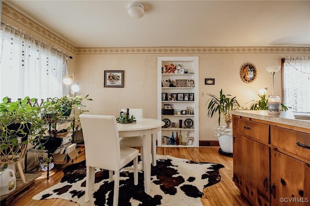 dining room featuring light wood-style floors