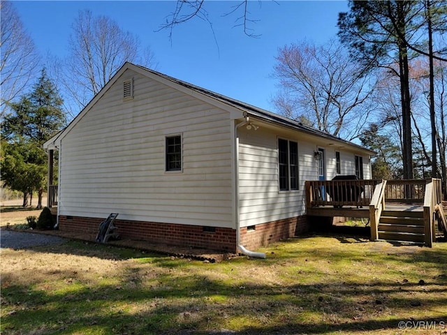 view of property exterior with a deck, a lawn, and crawl space