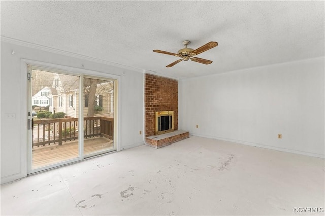 unfurnished living room featuring ceiling fan, a brick fireplace, concrete flooring, and a textured ceiling