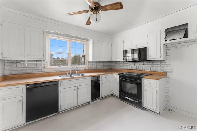 kitchen with a sink, decorative backsplash, black appliances, and light countertops