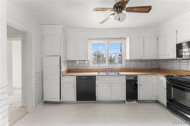 kitchen featuring black appliances, a sink, backsplash, white cabinets, and light countertops