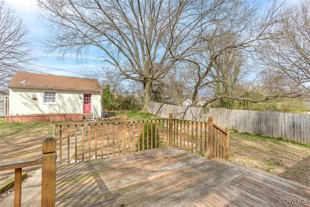 wooden deck featuring entry steps, an outdoor structure, and fence