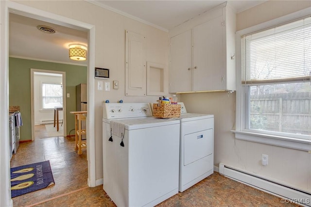 washroom featuring visible vents, a baseboard heating unit, ornamental molding, washer and dryer, and a baseboard radiator