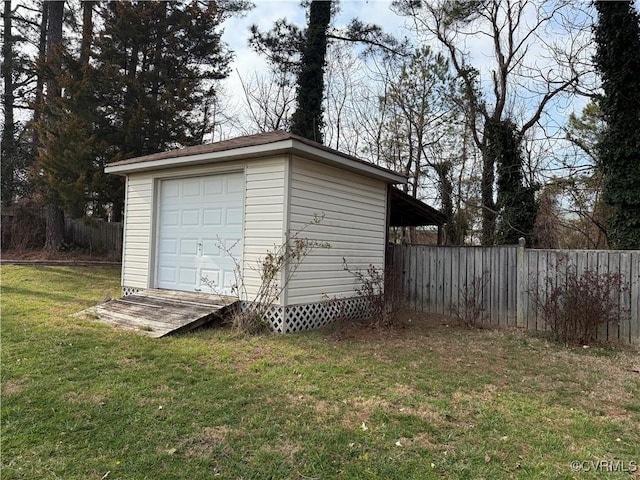 garage with fence