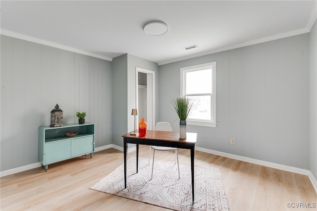 home office featuring visible vents, light wood-type flooring, and baseboards