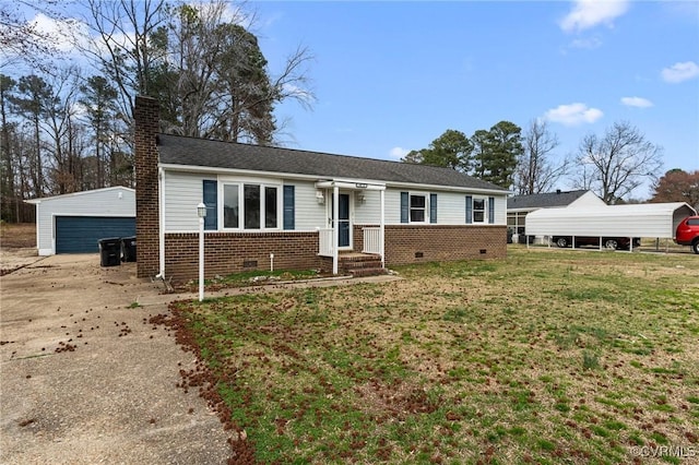 view of front of property with brick siding, a detached garage, crawl space, a chimney, and an outbuilding