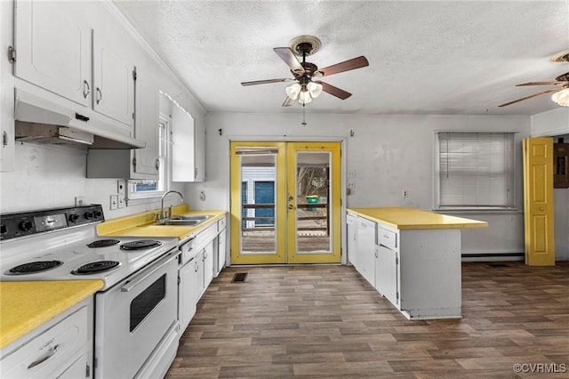 kitchen with under cabinet range hood, white appliances, a ceiling fan, and light countertops