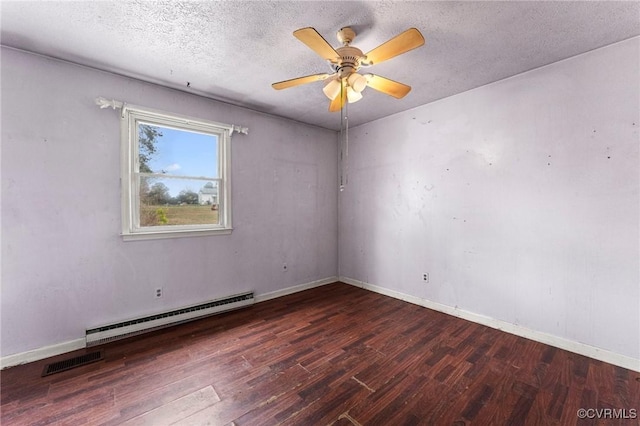 empty room featuring visible vents, ceiling fan, wood finished floors, a textured ceiling, and a baseboard radiator