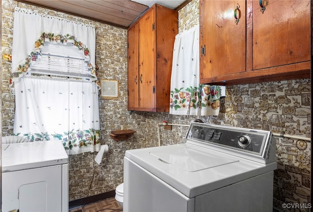 laundry room with washer and dryer and laundry area