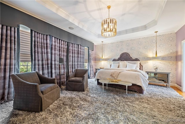 bedroom featuring wallpapered walls, crown molding, baseboards, a chandelier, and a raised ceiling